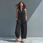 Casual women's sleeveless jumpsuit with buttoned stand collar and loose fit by Plush Fashion Hub, suitable for everyday wear.