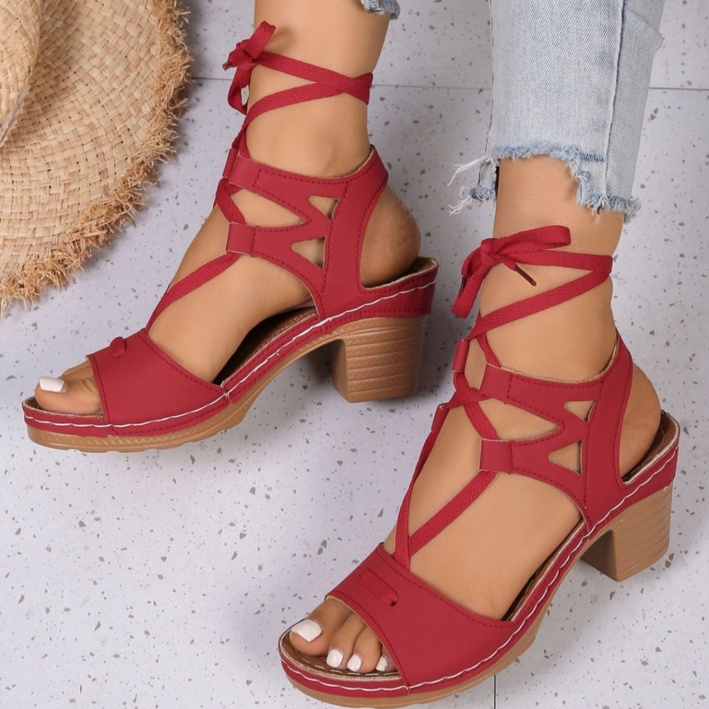 Women's chic lace-up block heel sandals with strappy design and mid-height heel, stylish shoes by Trendsi.