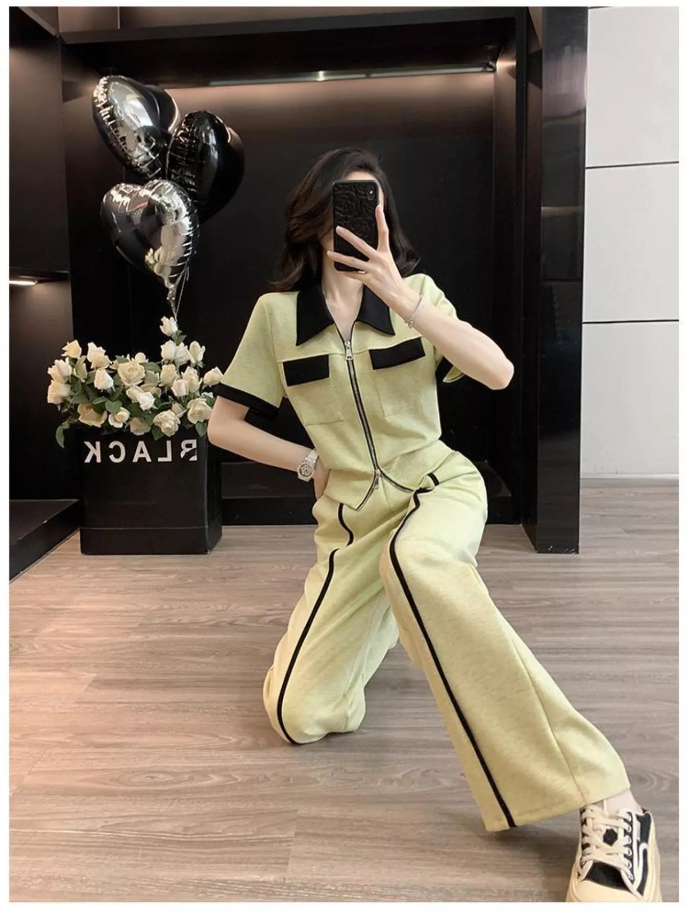 Contrast zip-up top and wide-leg pants set by Plush Fashion Hub, featuring a stylish two-piece outfit with modern design.