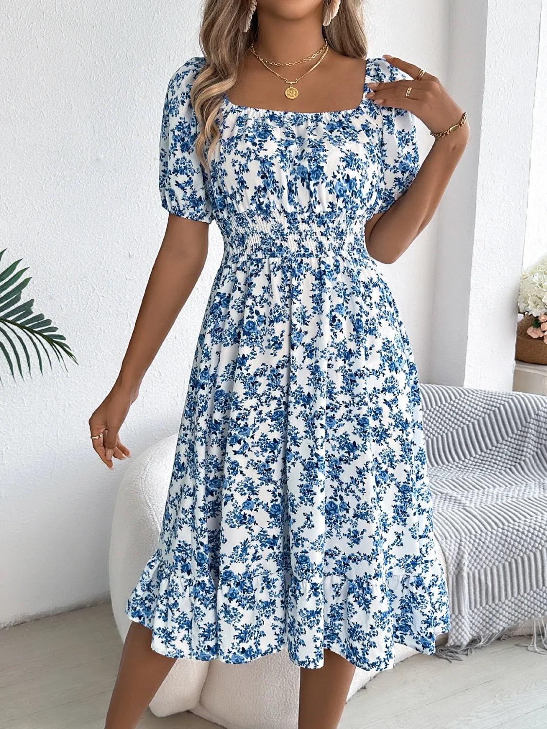 Floral puff sleeve dress with ruffled hem from Plush Fashion Hub, featuring a feminine design and lightweight fabric.