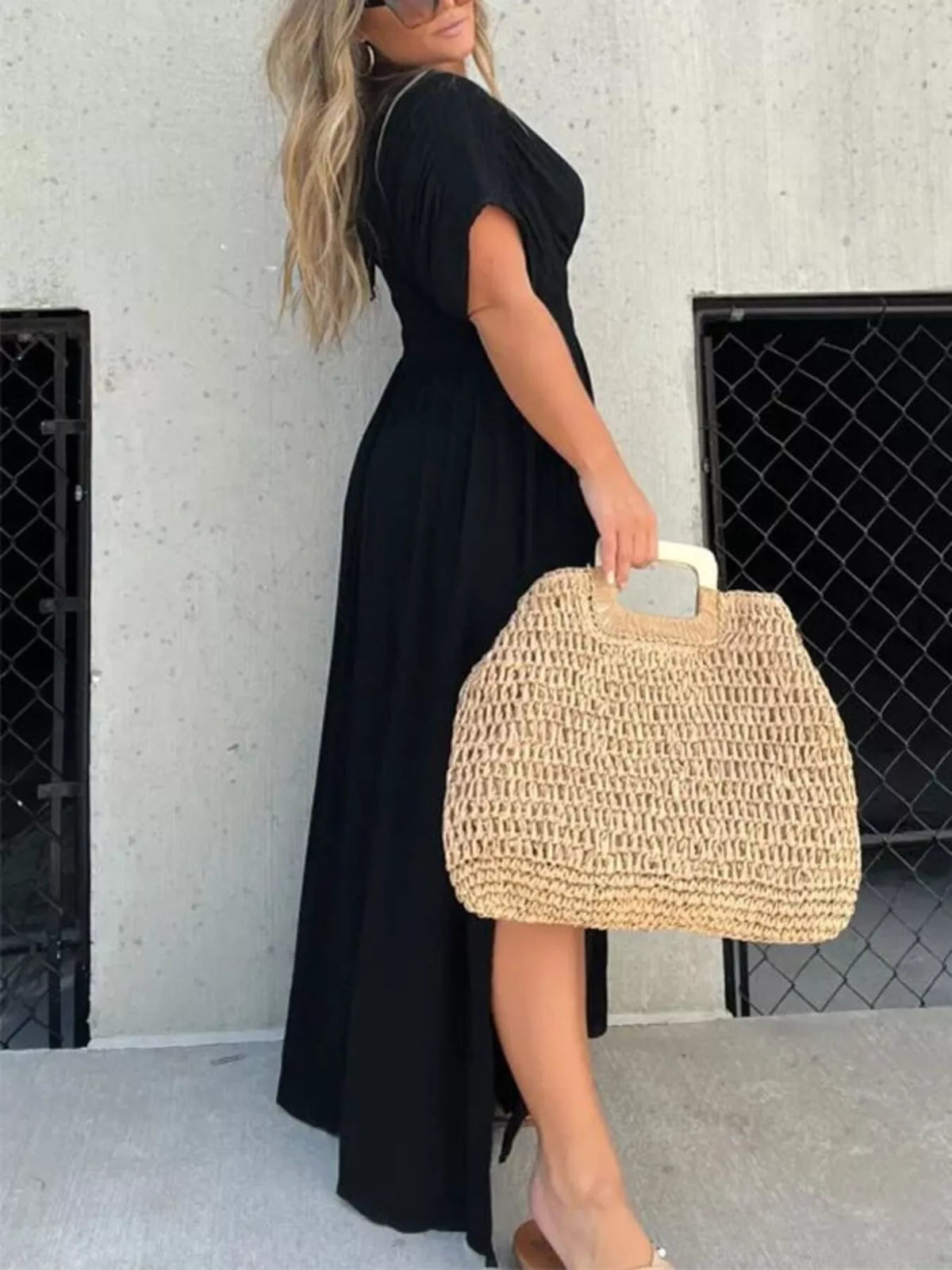 Plus size full slit V-neck smocked waist maxi dress by Plush Fashion Hub, featuring a flowing silhouette and elegant design.