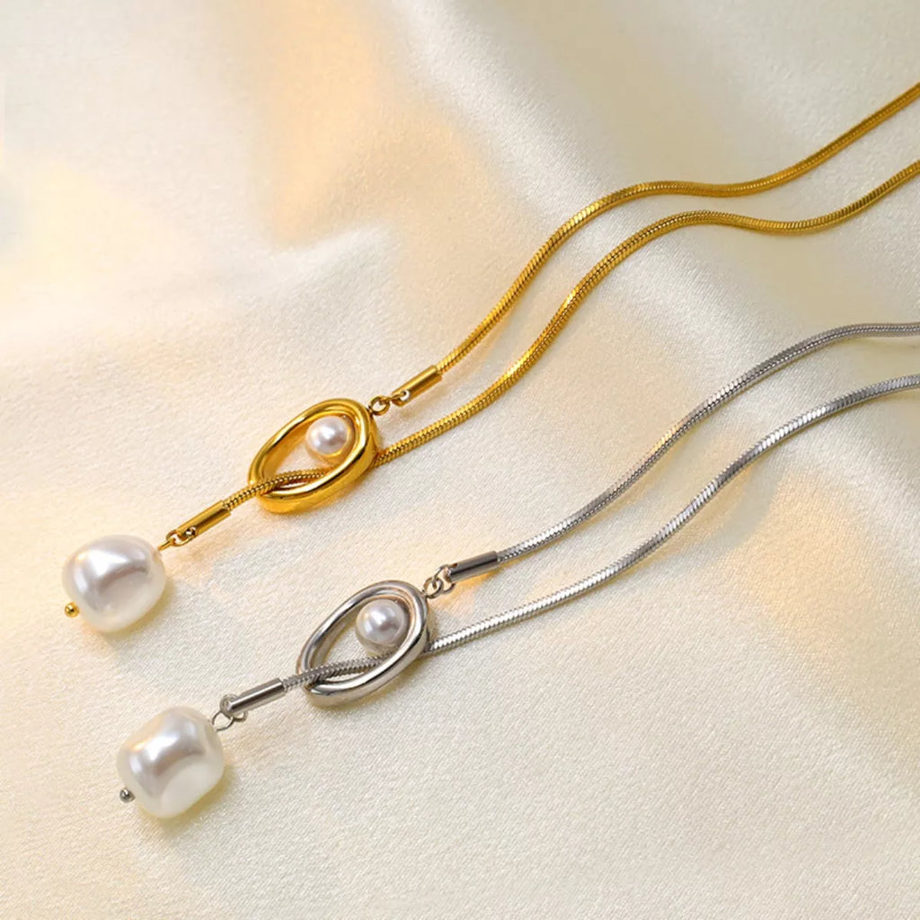 Pearl pendant necklace featuring a single white pearl on a delicate chain, stylish jewelry from Shopimist.