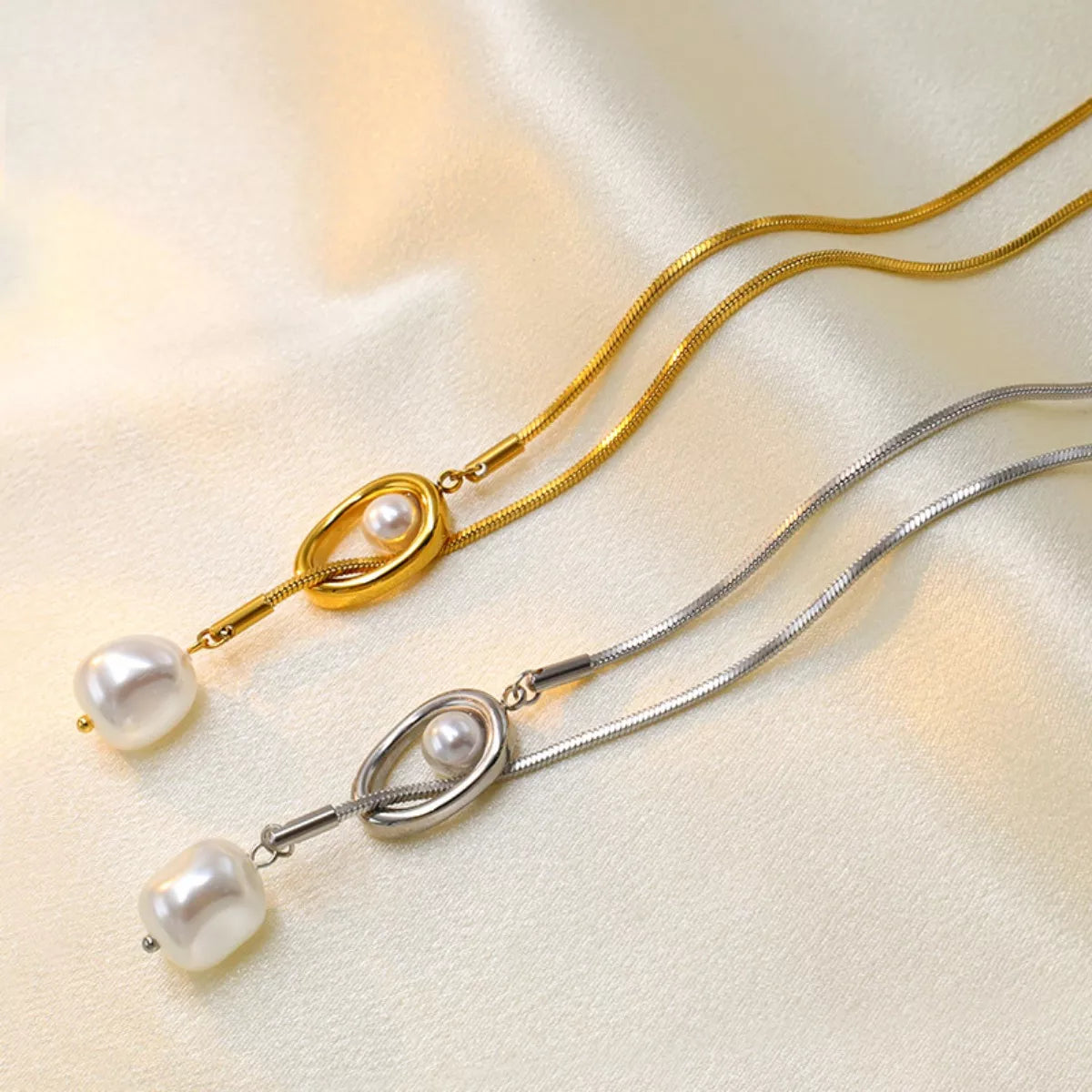 Pearl pendant necklace featuring a single white pearl on a delicate chain, stylish jewelry from Shopimist.