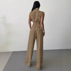 Women's lace-up V-neck vest and pants two-piece set by FitiqueFit, stylish and elegant for commuting, shown in the product image.