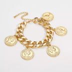18K gold-plated coin charm bracelet with detailed coin charms on a delicate chain, showcasing elegant jewelry craftsmanship.