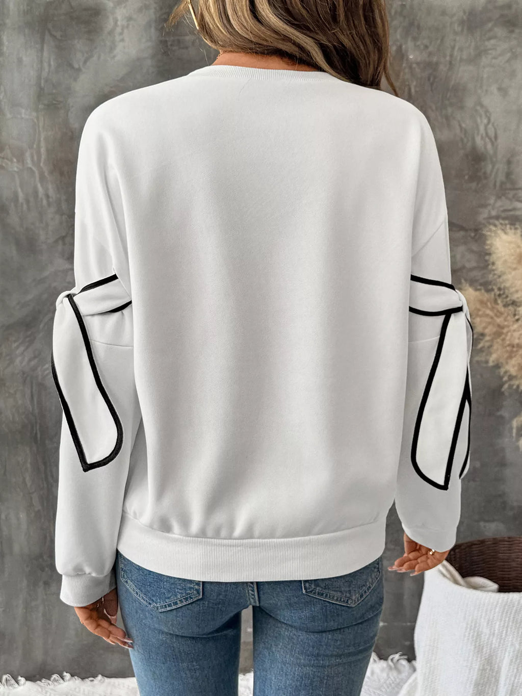 Gray side striped round neck sweatshirt from Trendsi featuring long sleeves and a comfortable fit, ideal for casual wear.