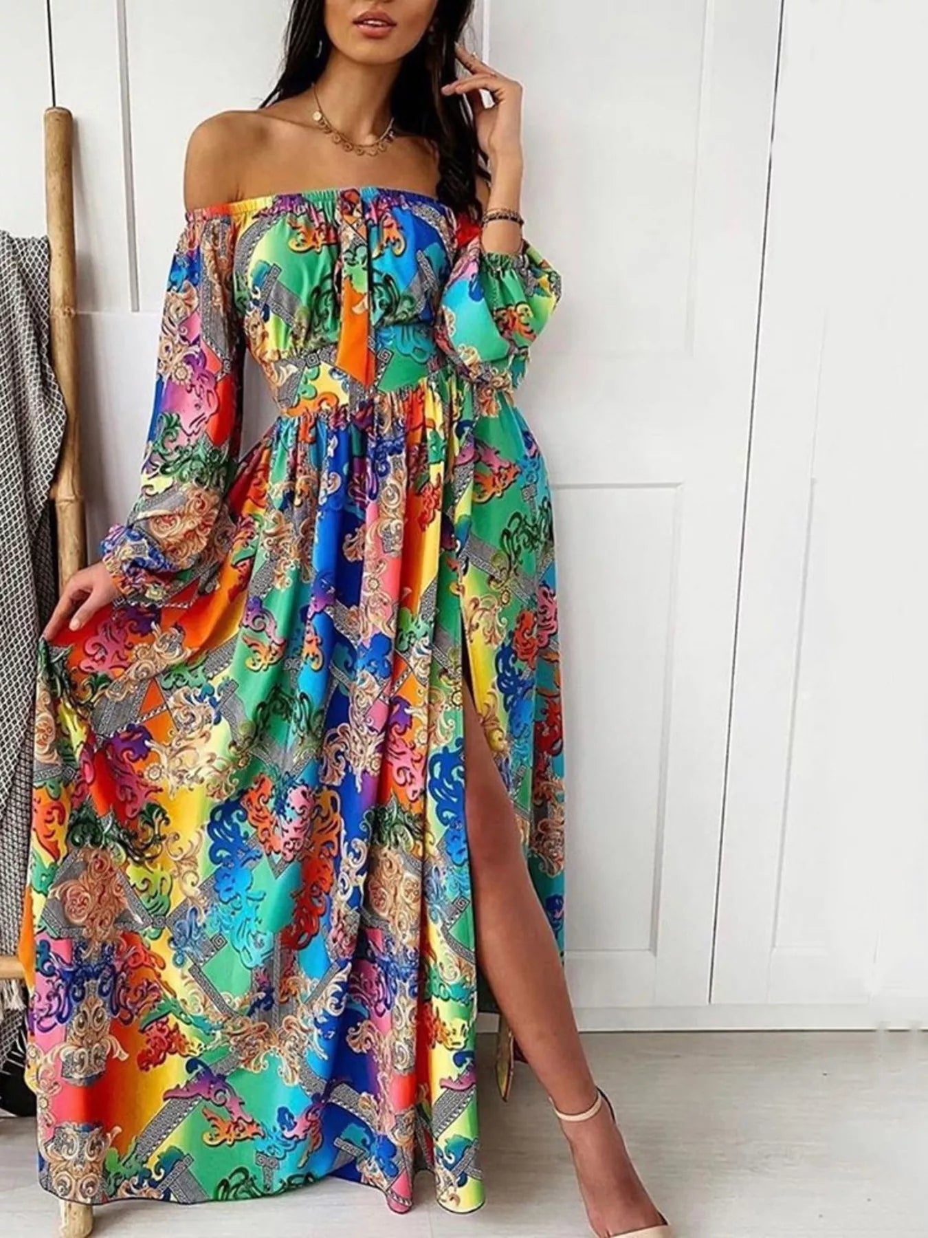 Plush Fashion Hub off-shoulder printed maxi dress with side slit, flowing fabric, perfect for elegant summer or casual wear.