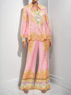 Women's printed lantern sleeve top and matching lounge pants set by Trendsi, featuring a comfortable, stylish casual wear look.