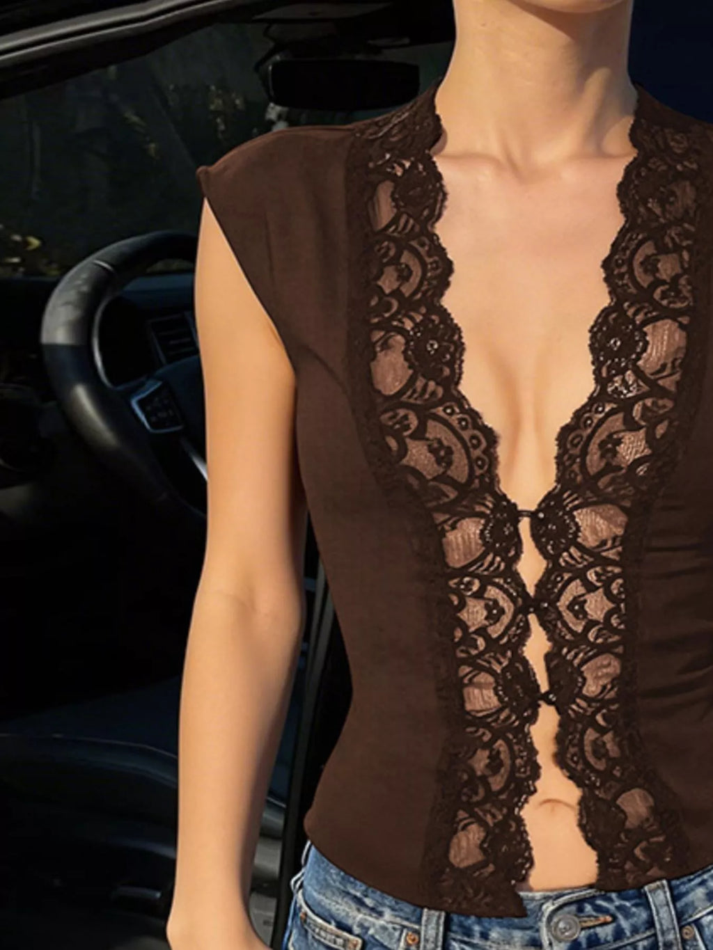 Lace trim button-front vest by Shopimist featuring a sleeveless design, delicate lace detailing, and a fitted silhouette.