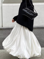 Flowy satin maxi skirt by Shopimist featuring a smooth, shimmering fabric and elegant, flowing silhouette.