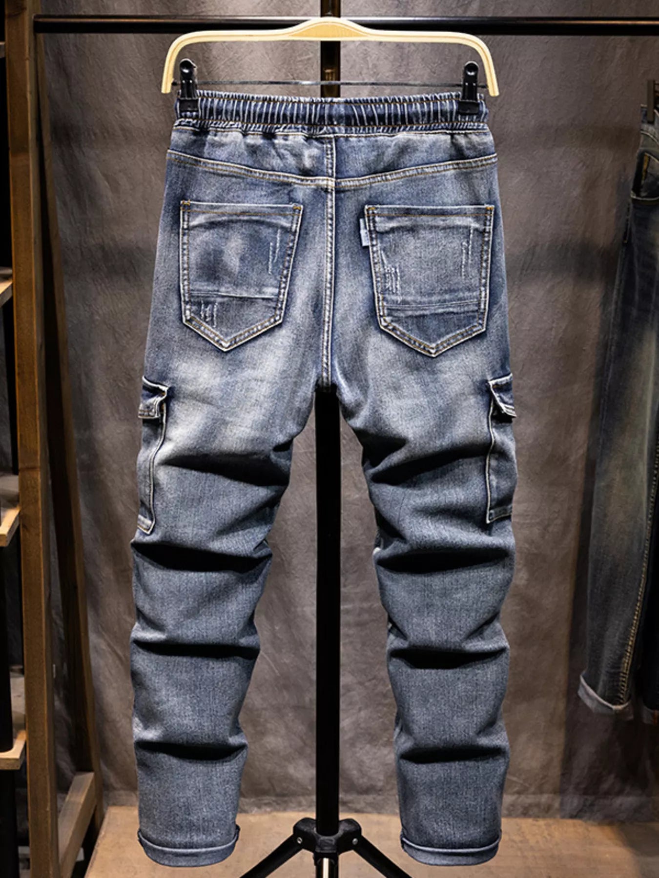 Men's relaxed fit drawstring jeans in plus size from Shopimist, featuring a comfortable waistband and classic denim look.