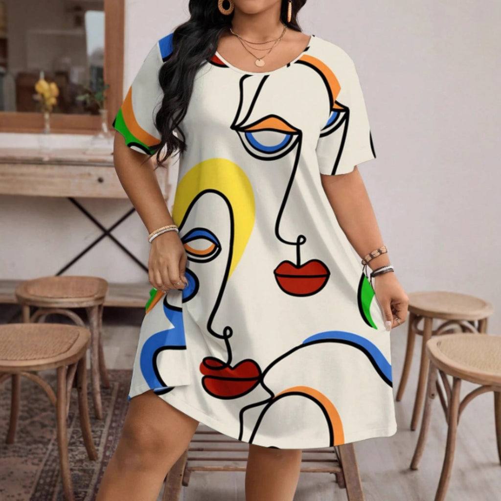 Women’s casual printed round neck short sleeve dress by Plush Fashion Hub, featuring a relaxed fit and stylish pattern.