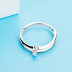 925 sterling silver double layered ring with intricate design, showcasing layered bands and polished finish.