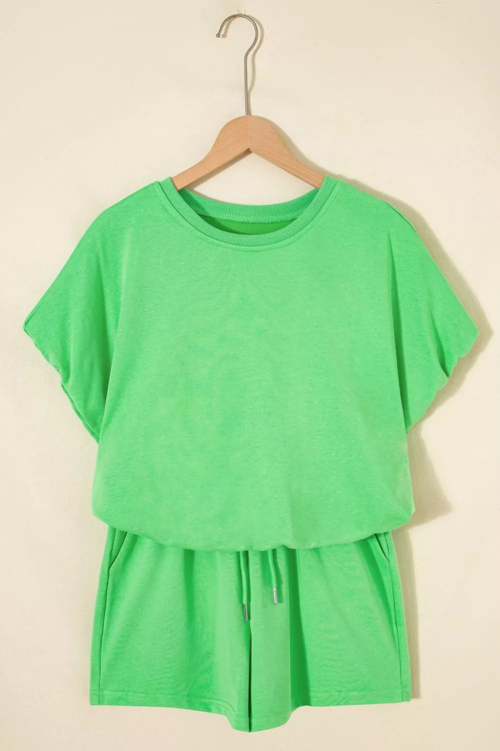 Pair of trendy solid color puffy loose fit drawstring shorts in a 2-piece outfit, shown in the trendy Rings collection.
