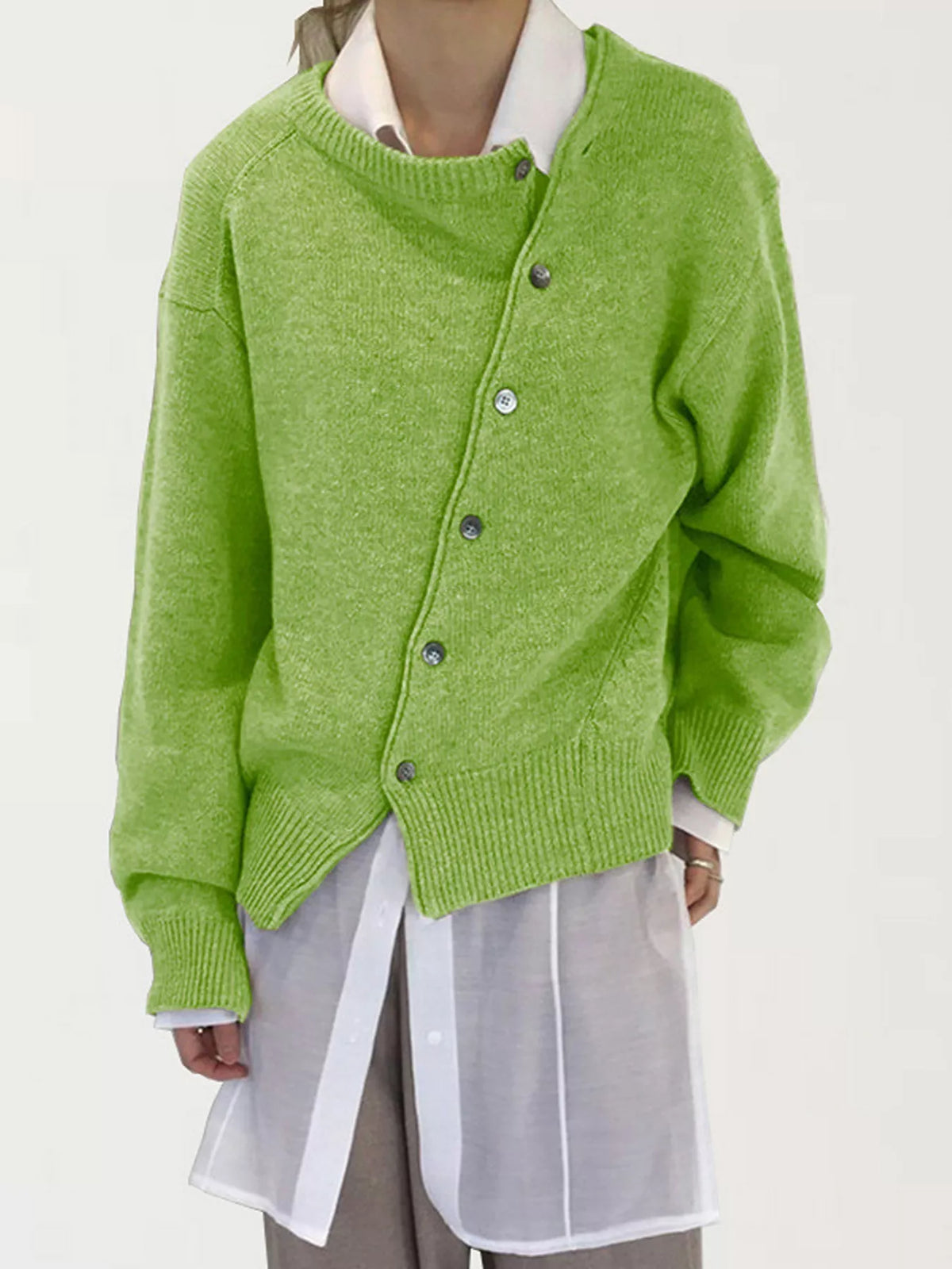 Asymmetric button-down sweater by Trendsi, featuring a stylish design with unique button placement and cozy knit fabric.