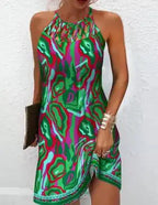 Women’s printed sleeveless hollow dress by Trendy Attic Store01 featuring a stylish design and lightweight fabric.