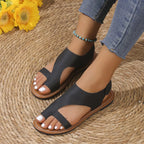 Leather toe loop flats sandals by Shopimist featuring a sleek design and comfortable fit with smooth leather straps.