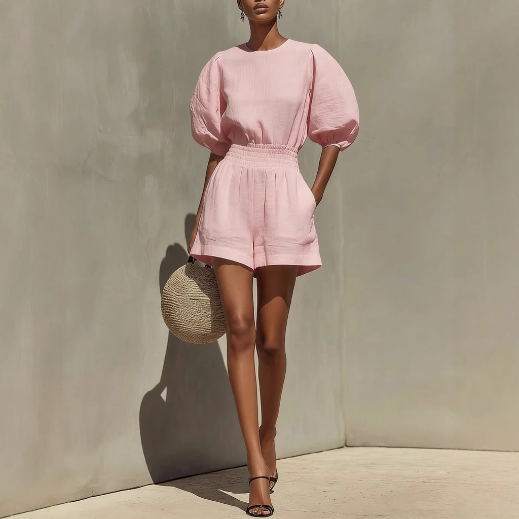 Women's puff-sleeve top and cropped shorts set by FitiqueFit, casual chic style, featuring a stylish top and matching shorts.