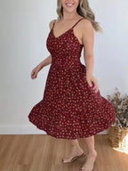 Floral print spaghetti strap midi dress with ruffle hem from Trendsi, showcasing a flowy, feminine design perfect for summer wear.