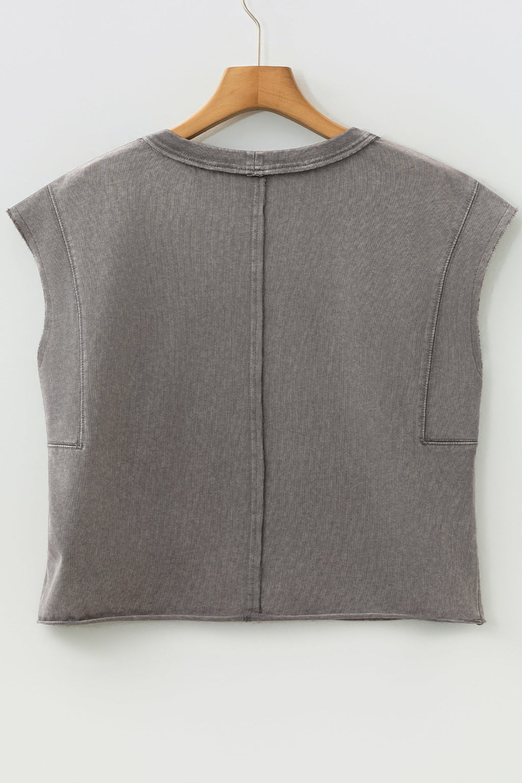 Light blue Ellianna Fit Cotton Tank Top by Threaded Pear displayed on a hanger, showcasing its sleeveless design and soft fabric.