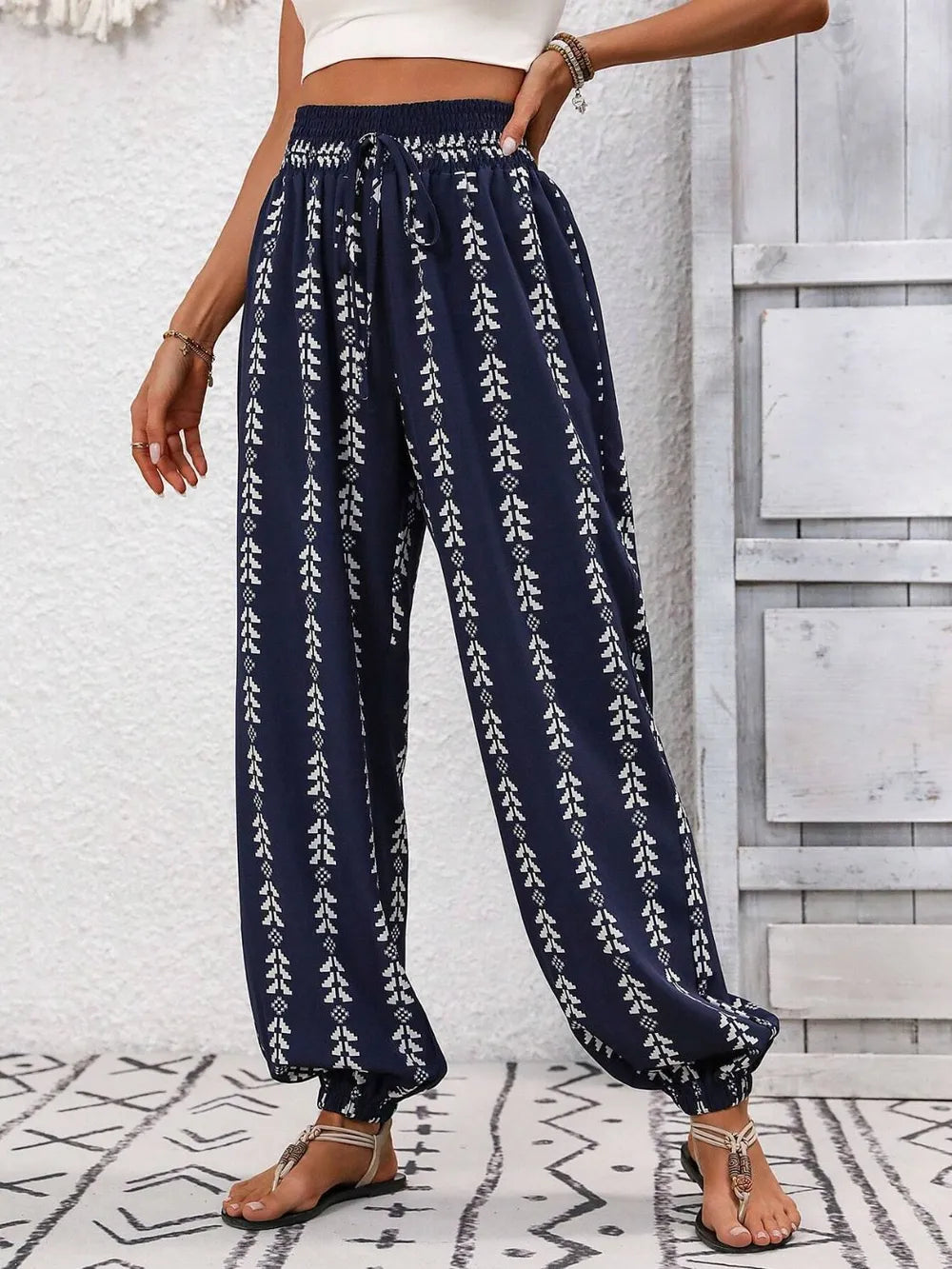 Plush Fashion Hub printed high-waisted pants with a stylish design, featuring a comfortable fit and modern fashion details.