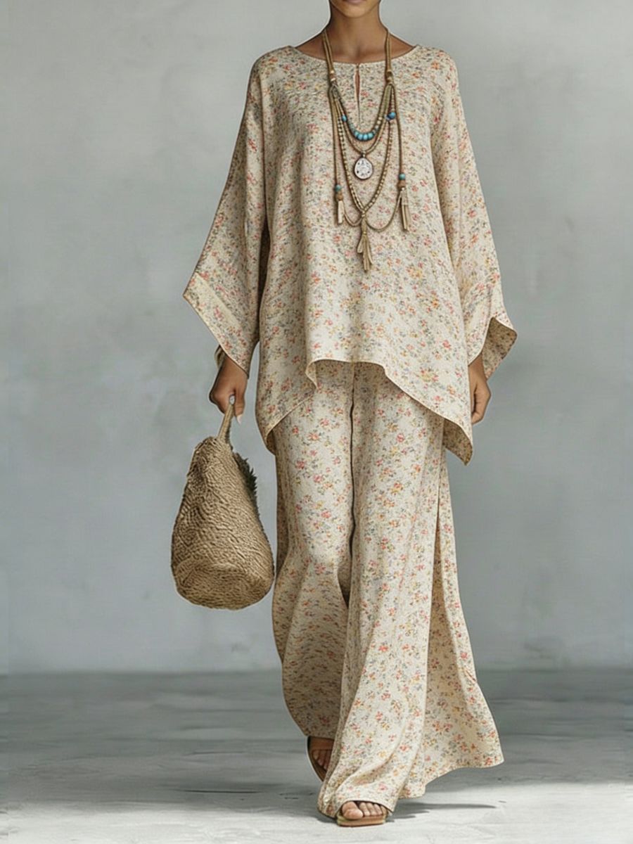 Floral print bamboo linen two-piece set with wide-leg pants by FitiqueFit, featuring a matching top and flowing trousers.