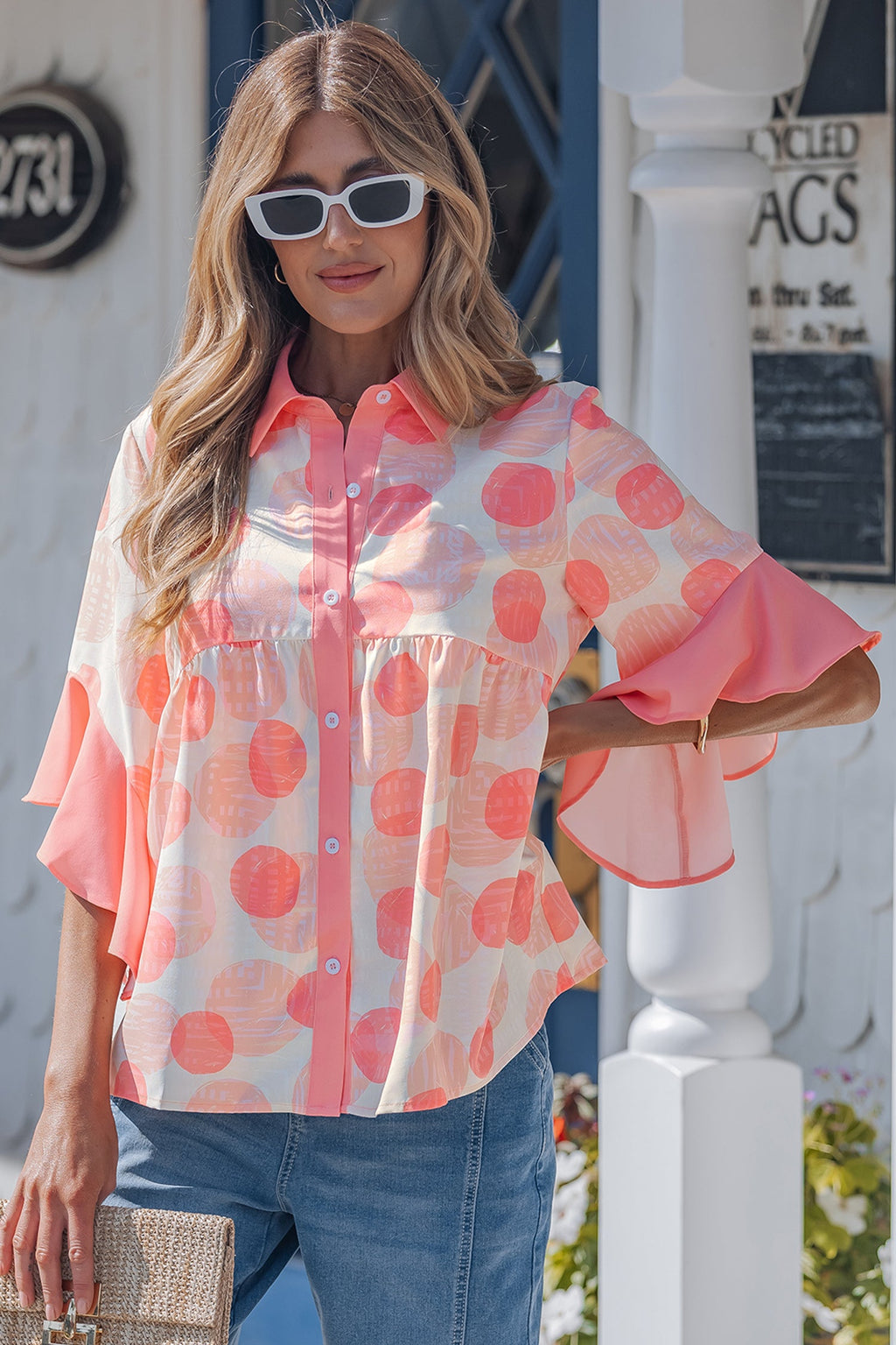 Angelica short sleeve babydoll blouse by Threaded Pear, lightweight fabric with a relaxed fit and feminine design.