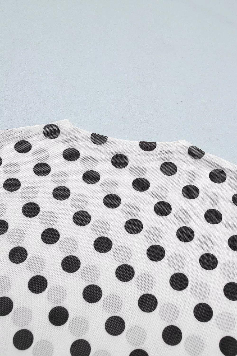 Polka dot mesh long sleeve sheath top with stand neck from Plush Fashion Hub, featuring a fitted silhouette and stylish design.