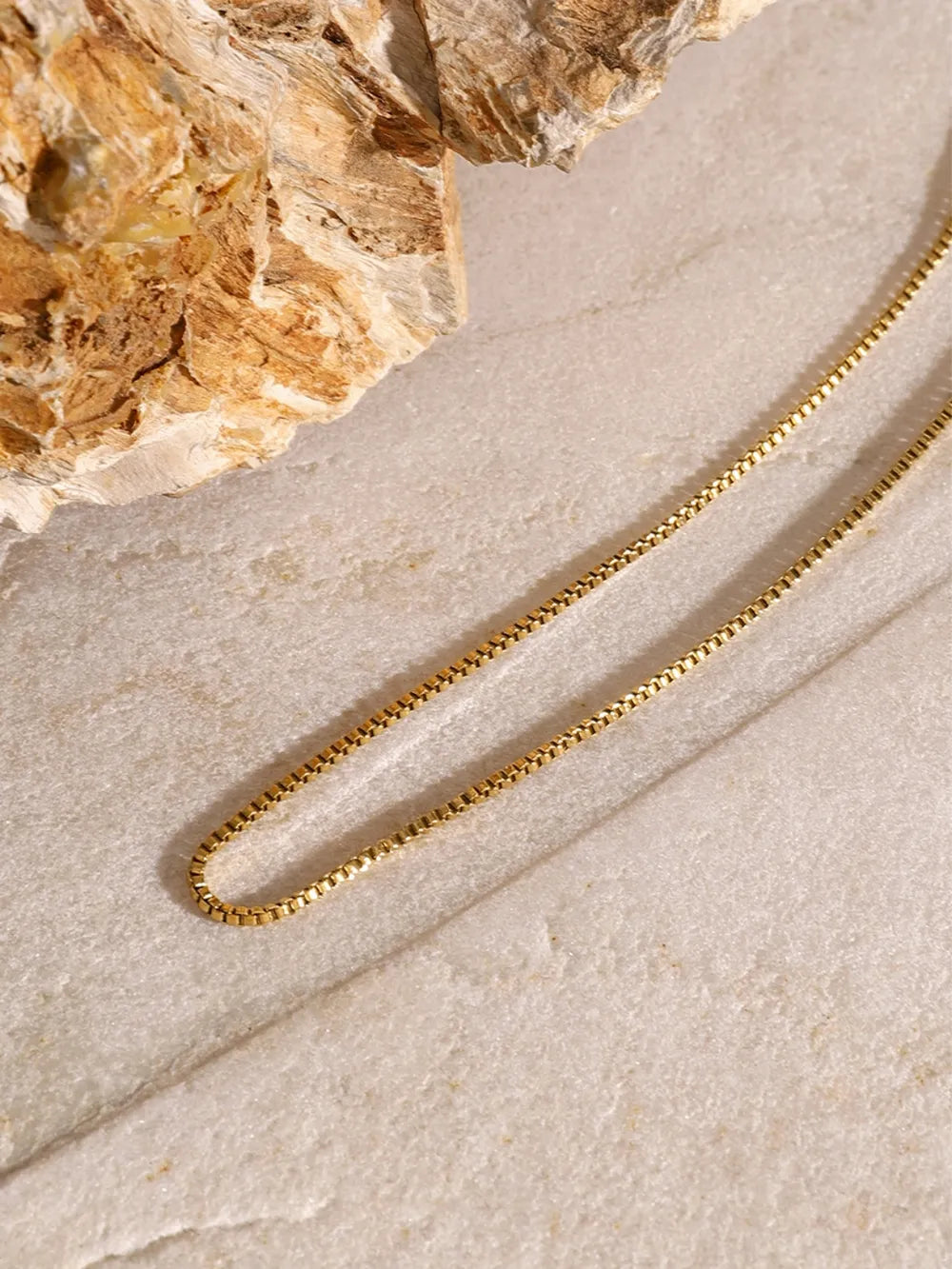 18K gold-plated three-layered cross necklace with intricate design, stylish jewelry piece, suitable for everyday wear.
