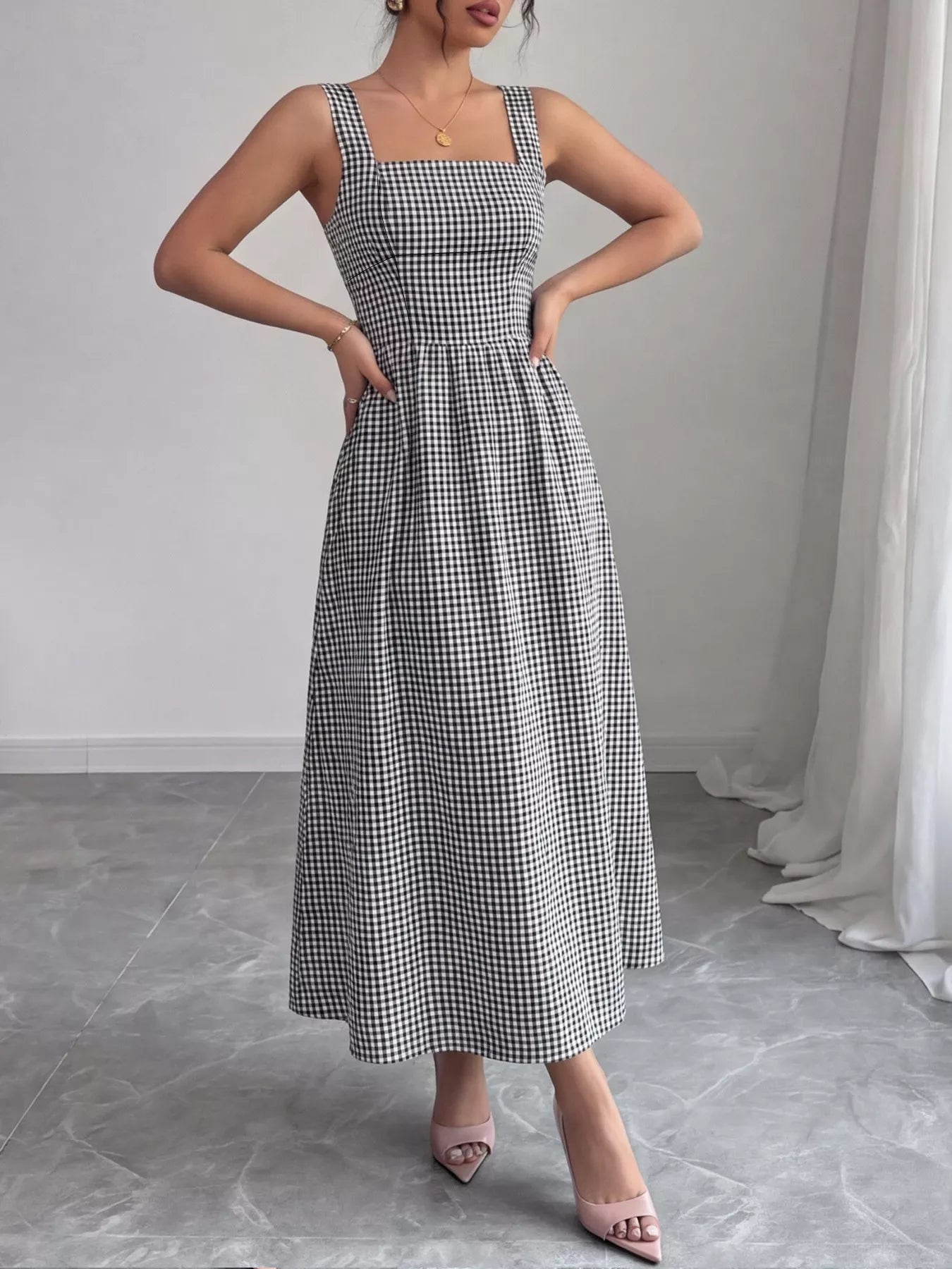 Square neck gingham midi dress by Shopimist featuring a fitted bodice and flowy skirt in classic black and white gingham pattern.