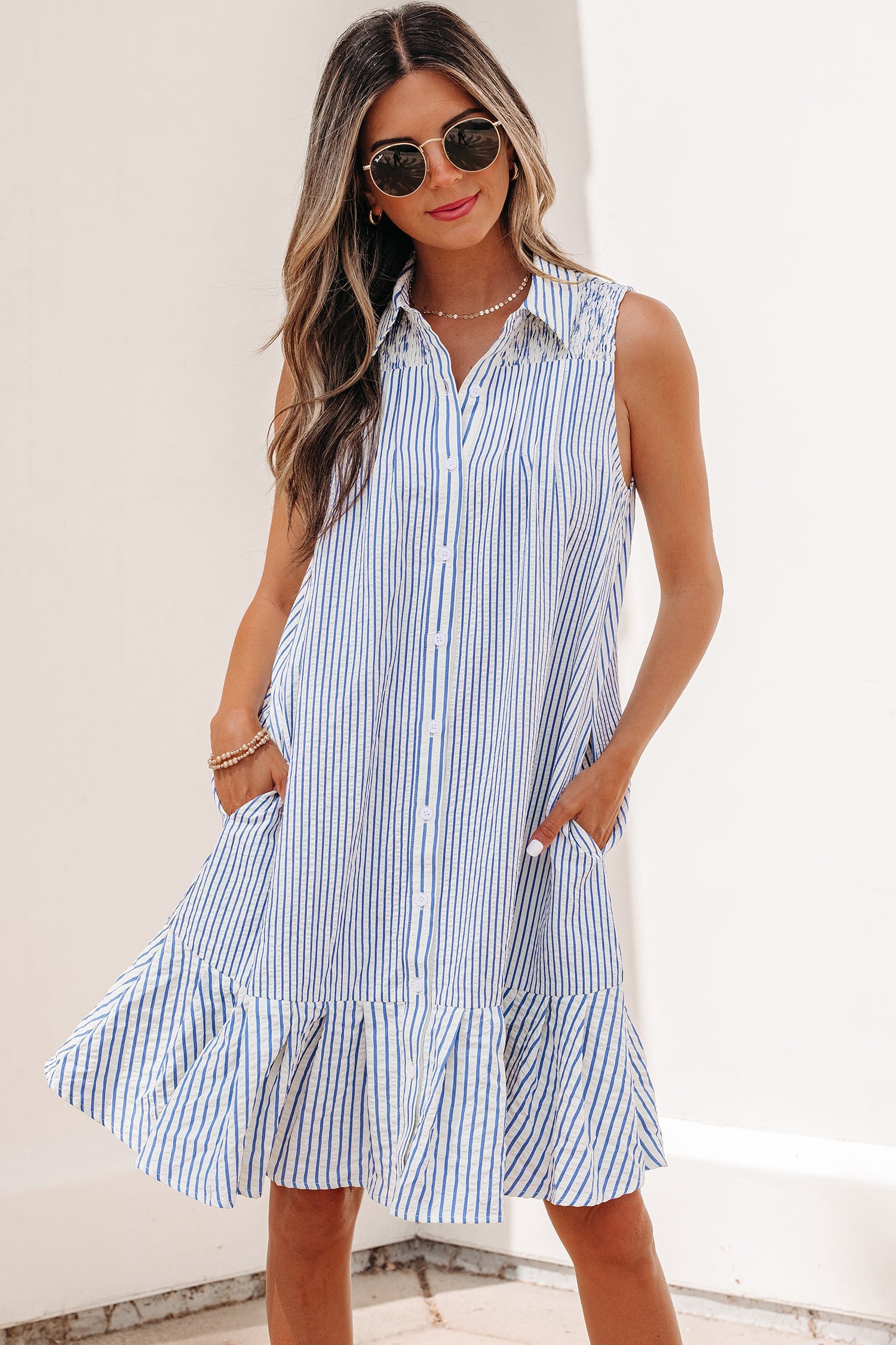 Noa Stripe Mini Dress by Threaded Pear featuring a stylish striped pattern and a flattering fit.