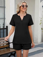 Solid color short sleeve top and shorts two-piece set from Trendsi, casual and comfortable summer outfit for women.