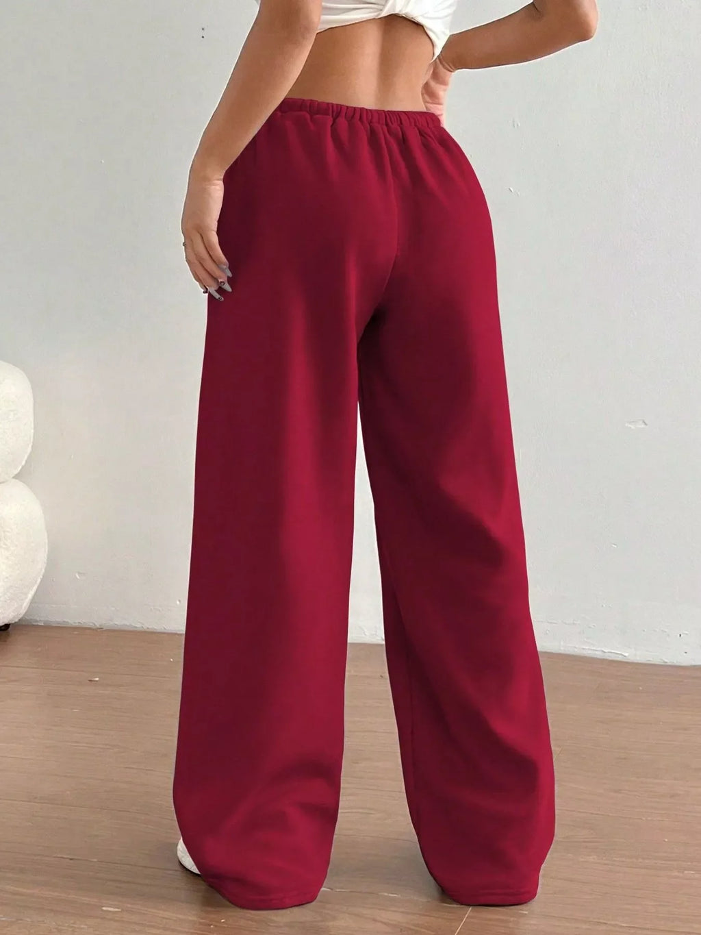 Simply Love casual drawstring high waist wide-leg sweatpants displayed on a model, showcasing comfortable, relaxed fit and soft fabric.