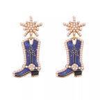 Cowgirl boot-shaped dangle earrings by Shopimist featuring Western-style jewelry with detailed cowboy boot design.