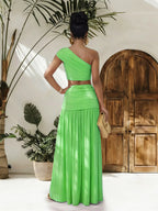 One-shoulder top and ruched maxi skirt set by Plush Fashion Hub, featuring a stylish off-shoulder top and flowing gathered skirt.