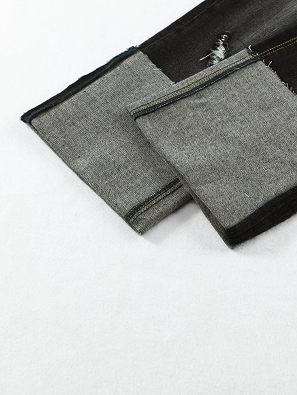 High waist distressed straight leg jeans from Trendsi, showing a close-up of the ripped details and classic denim texture.