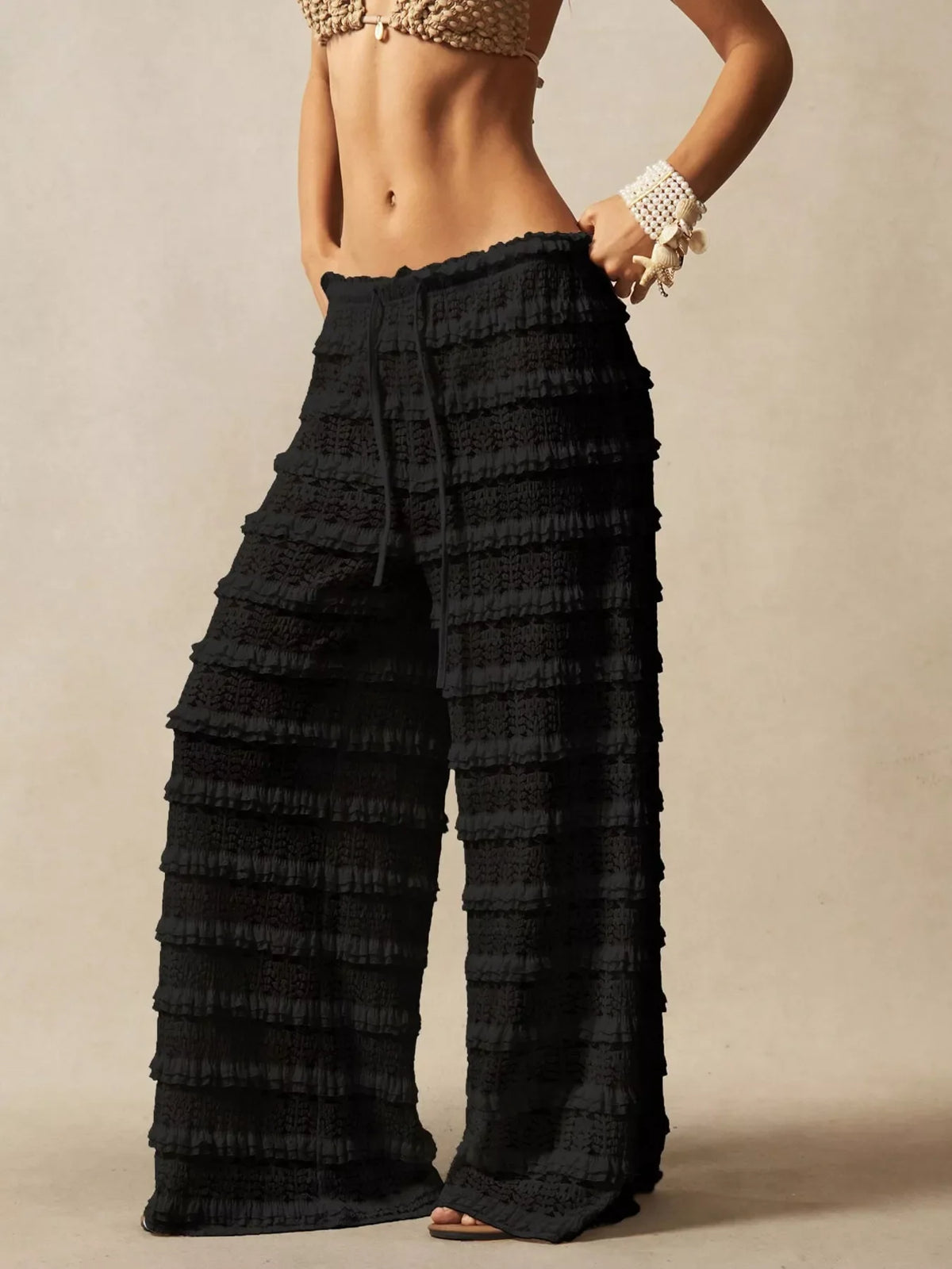 Lace drawstring wide-leg pants in soft fabric with lace detailing, designed by Plush Fashion Hub, shown on a model.
