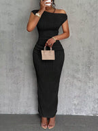 One-shoulder textured maxi dress by Plush Fashion Hub, featuring flowing fabric and elegant design for stylish occasions.