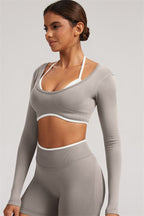 Fitglutes Activewear long sleeve crop top and leggings 2-piece set, stylish gymwear with fitted design for workout and fitness activities.