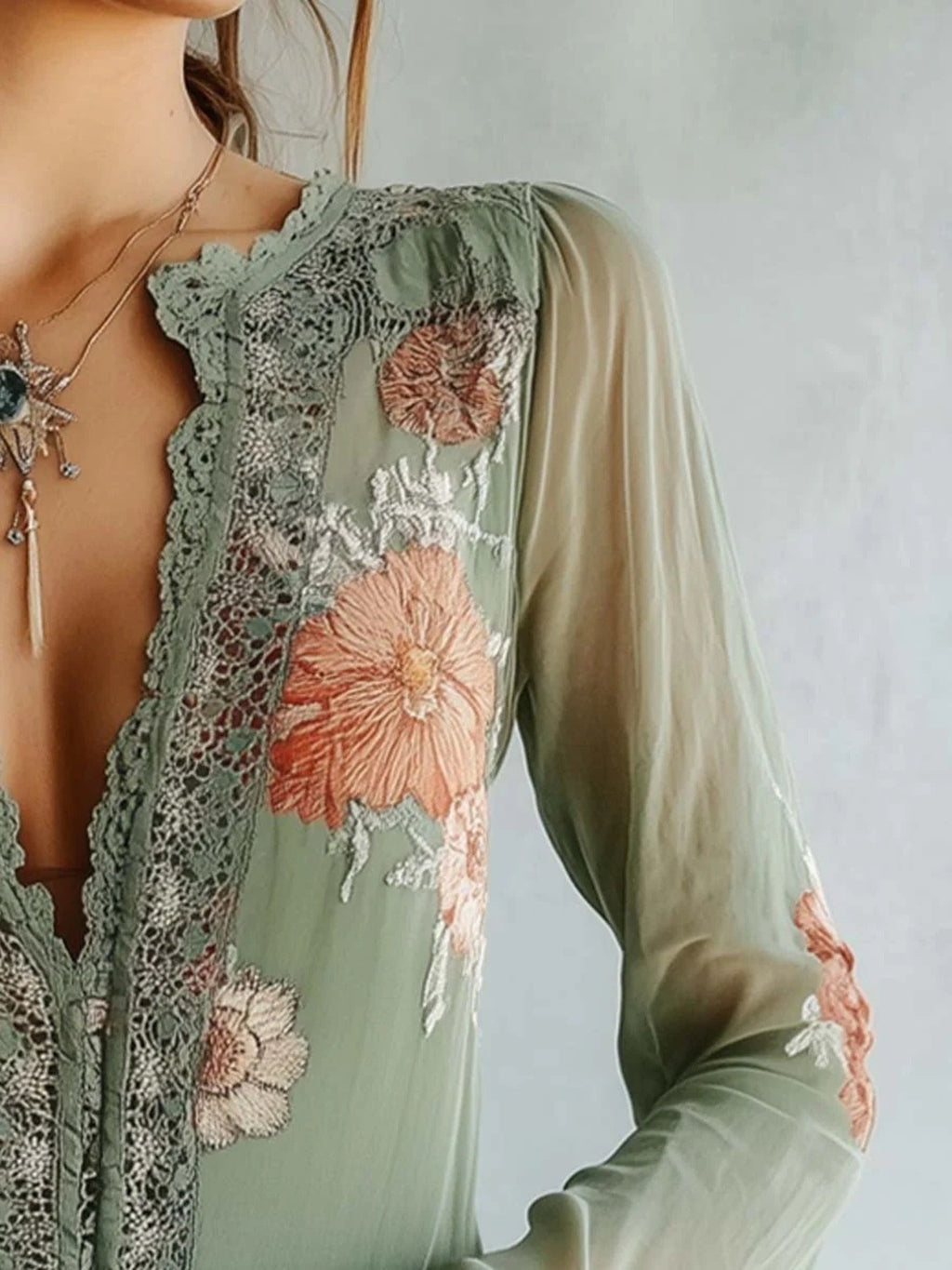 Elegant floral lace blouse by Plush Fashion Hub featuring long sleeves and a sophisticated feminine design.