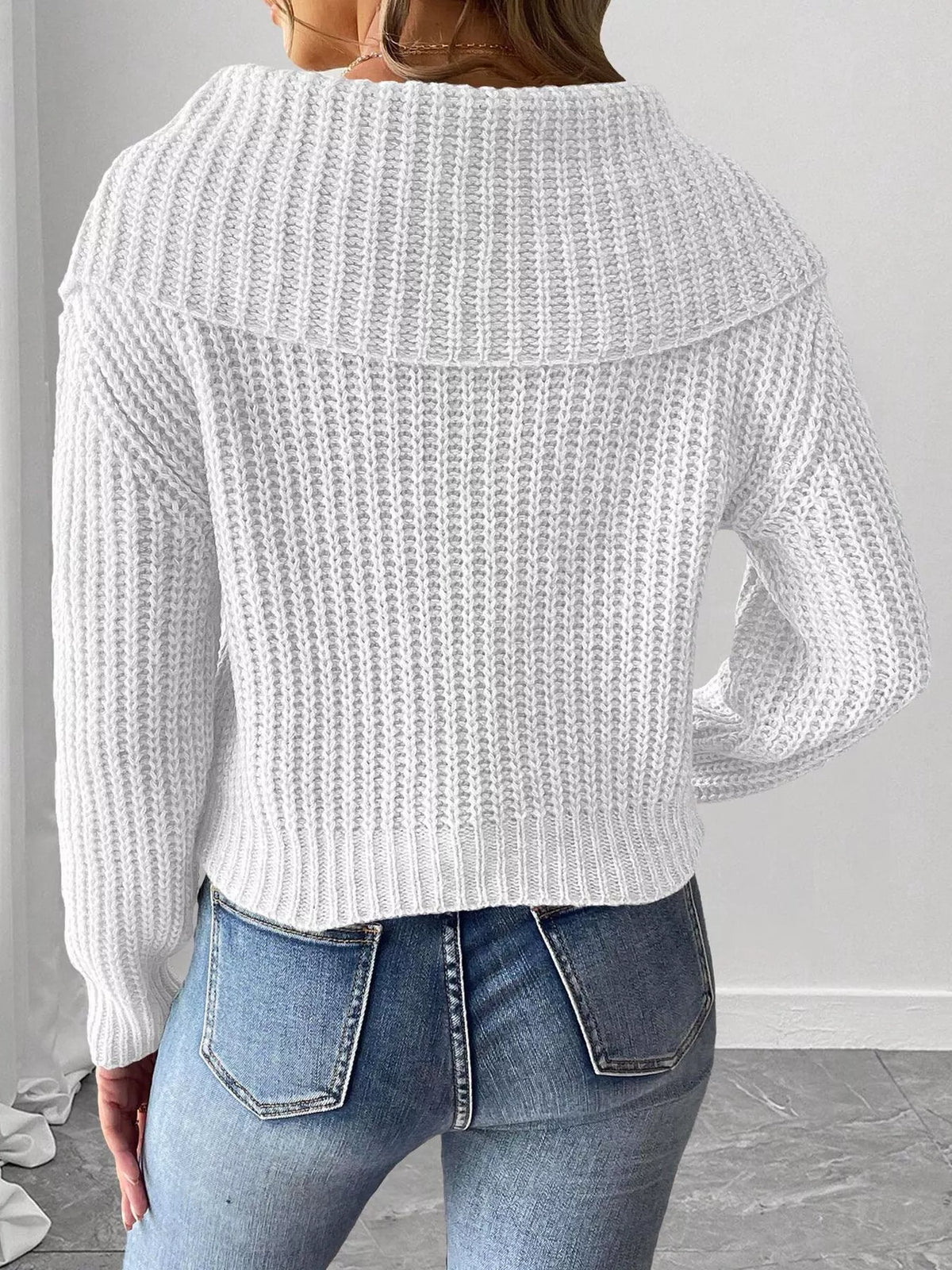 Contrast bow long sleeve sweater paired with a skirt, featuring a stylish design and cozy knit fabric from Trendsi.