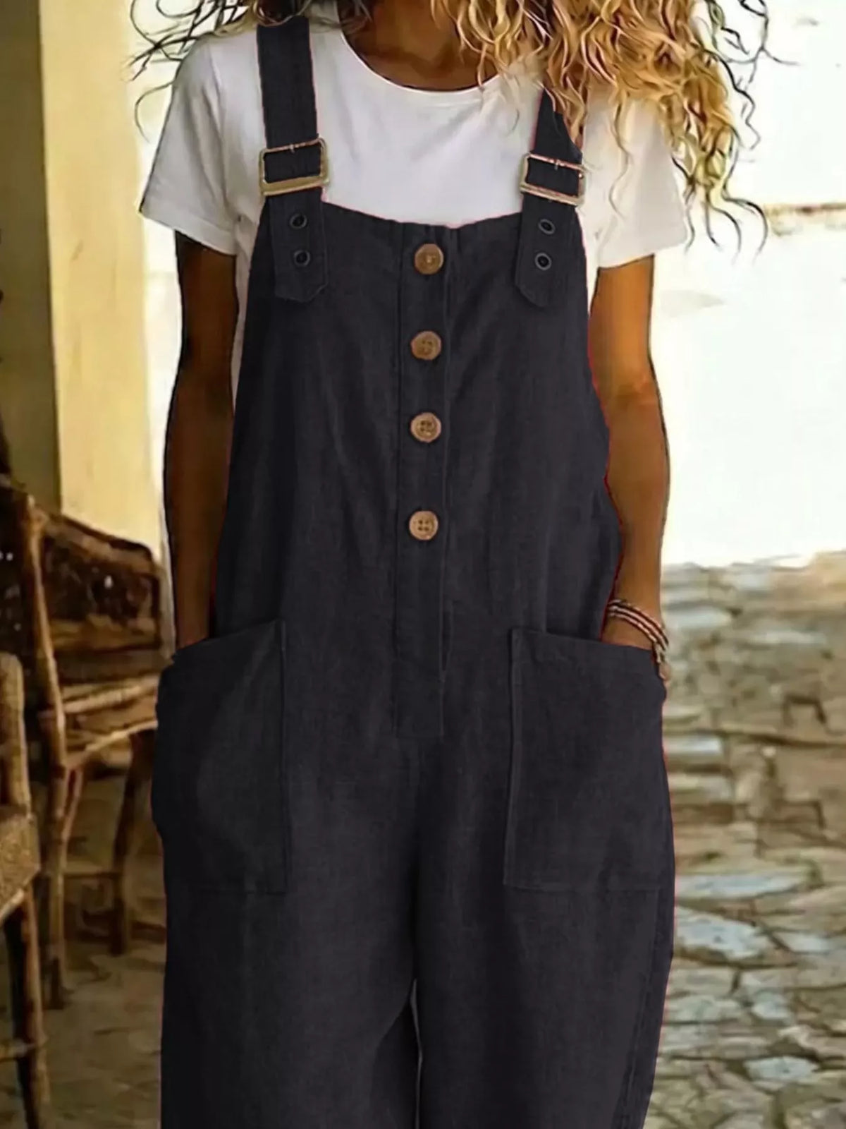 Casual button-front wide-leg overalls by Plush Fashion Hub, featuring relaxed fit and adjustable straps, shown in natural fabric.