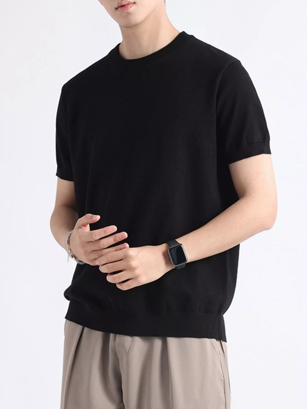 Men's plus size casual knitted short sleeve T-shirt from Trendsi, featuring a comfortable and stylish tops design in soft fabric.
