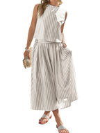 Women's striped sleeveless top and midi skirt two-piece set by Trendsi, shown in a stylish, coordinated ensemble.