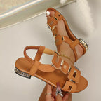 Open toe flats sandals by Shopimist with tan straps and cushioned soles, perfect for casual summer wear.