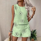 Women's floral print tank top and shorts two-piece casual set by FitiqueFit, perfect for summer, featuring bright floral patterns.