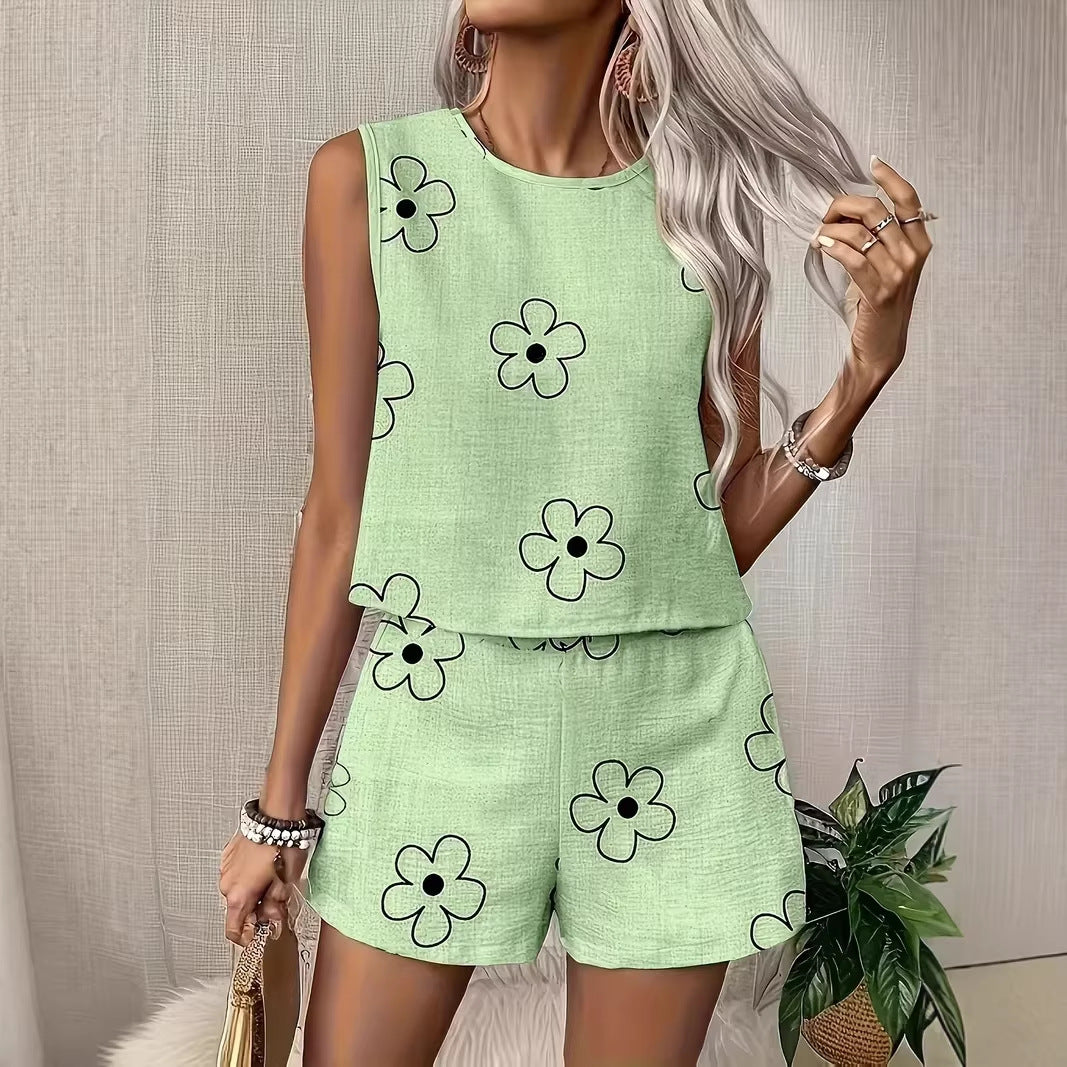 Women's floral print tank top and shorts two-piece casual set by FitiqueFit, perfect for summer, featuring bright floral patterns.