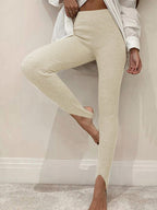 Ribbed mid waist leggings from Shopimist, showing a close-up of the textured fabric and fit on a model.