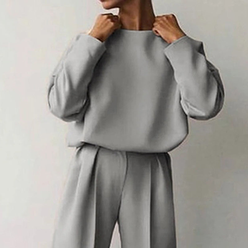 Women’s solid color 2-piece loungewear set with long sleeve top and pleated pants by FitiqueFit, casual and comfortable.