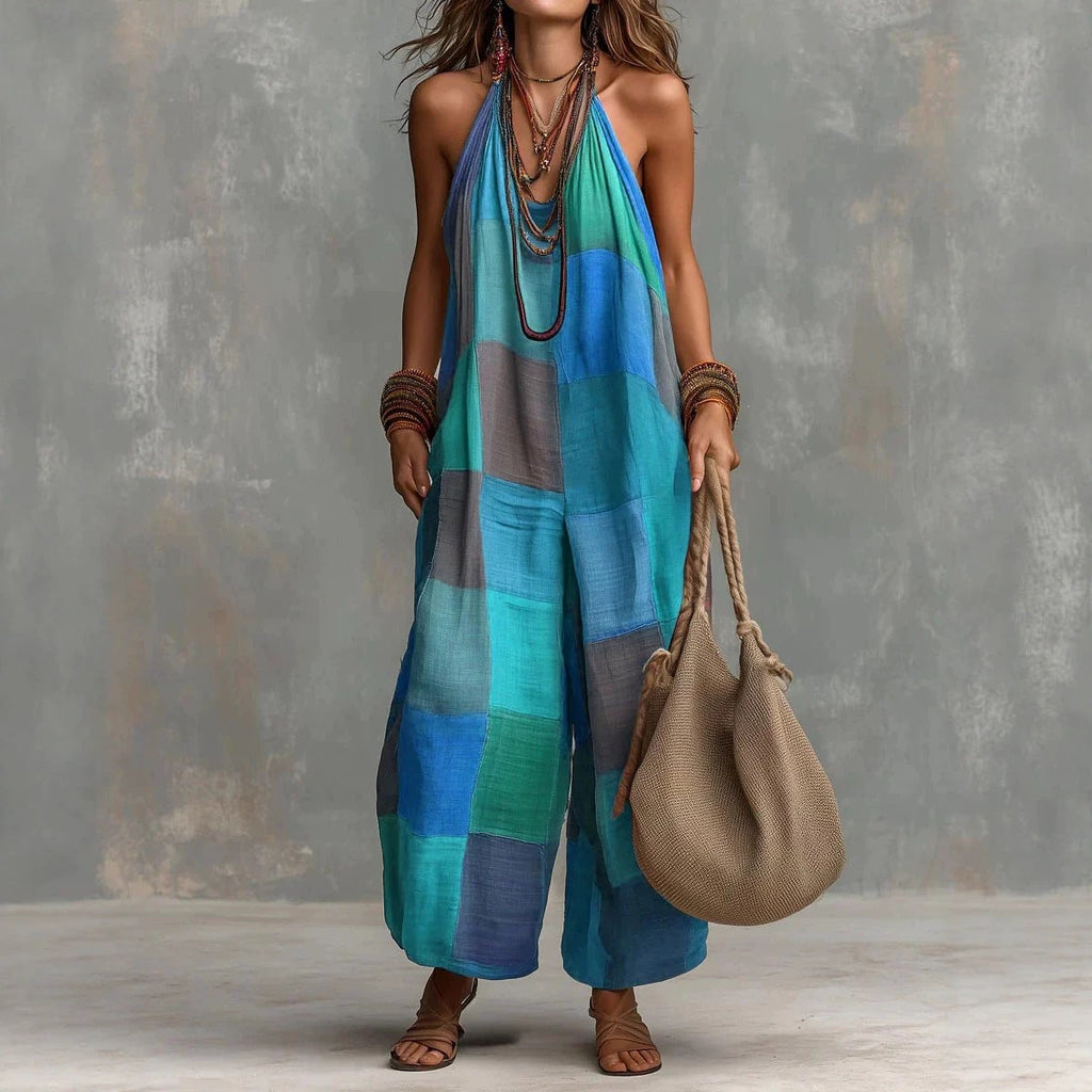 Women's plaid print jumpsuit by Plush Fashion Hub featuring sleeveless design, wide-leg style, and suspender straps.